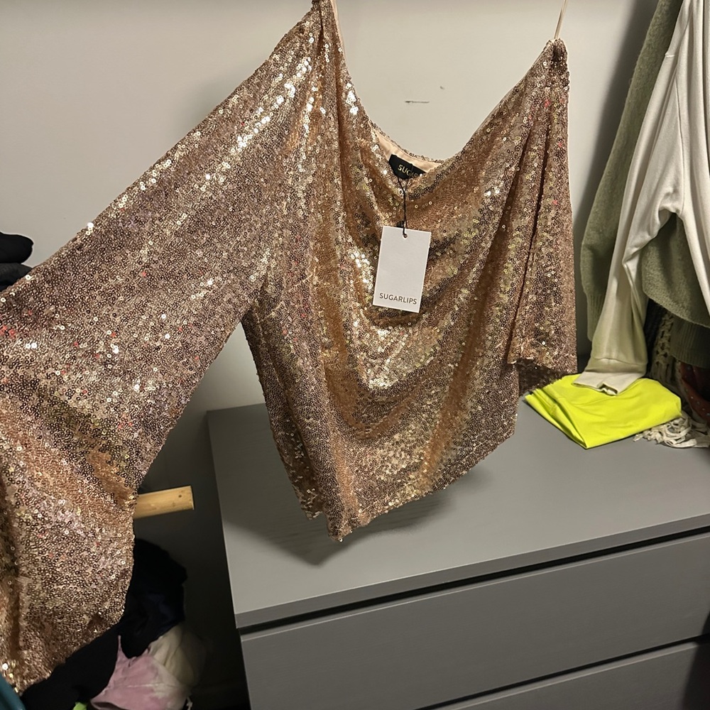 Perfect Holiday sparkly one sleeve top!